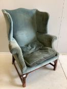 A George III upholstered wing back armchair, width 84cm, depth 64cm, height 105cm. Condition - fair