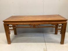 A Chinese carved hardwood altar or serving table, width 184cm, depth 75cm, height 83cm.