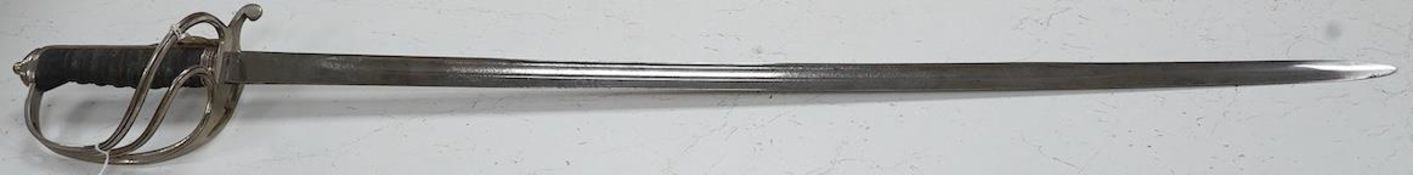 A George VI Royal Artillery officer’s sword, regulation etched blade and plated triple bar guard,