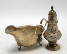 A late Victorian repousse silver pedestal sugar caster, Birmingham, 1893, 14.2cm, together with a