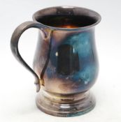 A George V silver baluster mug, with later engraved inscription, Joseph Gloster Ltd, Birmingham,