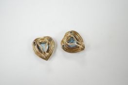 A pair of yellow metal, single stone heart shaped aquamarine and three stone diamond chip set