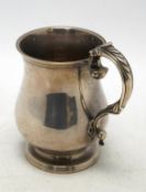 A William IV silver baluster christening mug, maker's mark rubbed, London, 1832, 11.8cm, 7.5oz, with