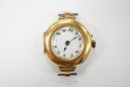 A lady's 18k manual wind wrist watch, with Arabic dial, no strap, gross weight 17.1 grams, Condition
