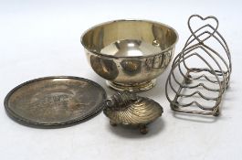 An Edwardian silver five bar toast rack, 96mm, together with a silver sugar bowl, a small silver