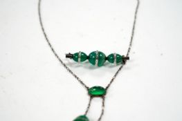 A white metal and green paste set double drop pendant necklace, 54cm and a similar brooch. Condition