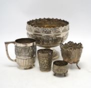 An Indian repousse white metal pedestal bowl, diameter 15.5cm (a.f.), a similar mug, small vase,