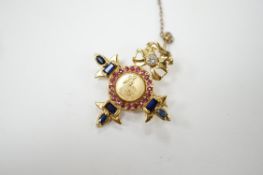 A modern 18ct gold, ruby, sapphire and diamond set brooch, depicting Britania, 30mm, gross weight