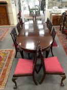 A Chippendale Revival mahogany dining suite comprising an extending dining table, width 300cm