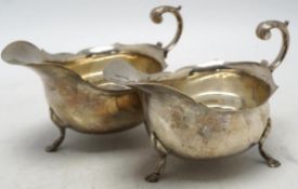 A pair of George V silver sauce boats, Nathan & Hayes, Chester, 1915, length 16.1cm, 12.6oz.