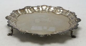 An early George III silver waiter, Ebenezer Coker, London, 1761, 17.1cm, 5.7oz. Condition - poor