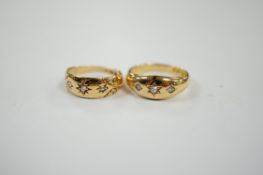A late Victorian 18ct gold and gypsy set three stone diamond ring, size M and a similar smaller
