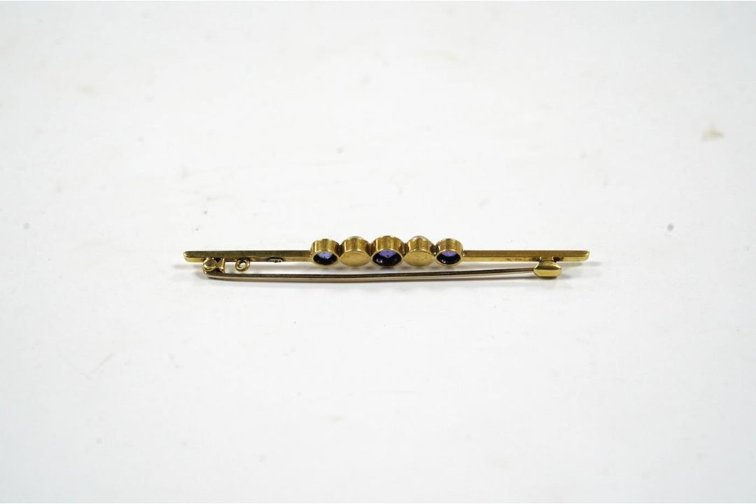 An Edwardian 15ct, three stone sapphire and two stone split pearl set bar brooch, 64mm, gross weight - Image 2 of 2