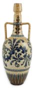 George Tinworth for Doulton Lambeth, a large stoneware vase, with scrolling blue foliate decoration,