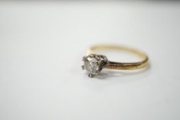 A modern 18ct gold and solitaire diamond set ring, size N, gross weight 2.8 grams. Condition - fair
