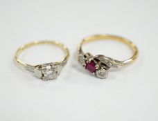 An 18ct, ruby and diamond chip set three stone crossover ring, size R and an 18ct, plat and