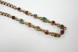 An early 20th century yellow metal and multi gem set bracelet, 19cm, gross weight 10.6 grams.