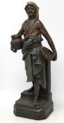 A large Austrian cold painted terracotta figure of a street seller, 59cm high. Condition - fair to