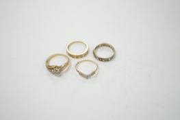 Two modern 9ct gold and diamond set rings and a 9ct gold, simulated diamond set chevron shaped