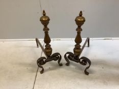 A pair of brass and wrought iron fire dogs, length 54cm, height 71cm. Condition - fair