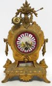 A 19th century gilt spelter mantel clock, with ceramic decorated dial and panel, 30cm high.