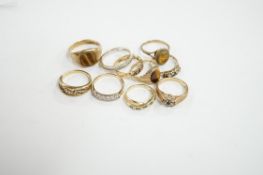 Ten assorted modern 9ct gold and mainly gem set rings, including two with tiger's eye quartz and a