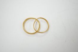 Two 22ct gold wedding bands, 4.3 grams. Condition - fair