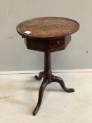A George III provincial oak circular tripod wine table, fitted drawers, diameter 39cm, height