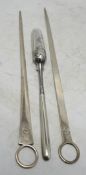 Two George III silver meat skewers by John Lias, London, 1800 and 1801, 29.9cm, together with an