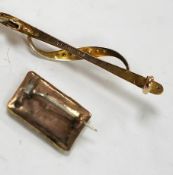 A Victorian gilt metal and plaited hair mourning brooch, 18mm and a yellow metal and seed pearl