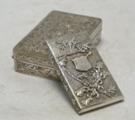An early 20th century Chinese Export white metal card case by Wang Hing, 84mm, together with a