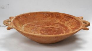 An Ancient Greek terracotta two-handled dish, circa 5th/4th century BC. Condition - good restored