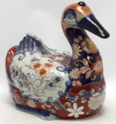 A large porcelain duck box, decorated in the Imari pattern, 40cm wide. Condition - fair