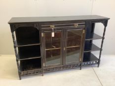 A late Victorian Aesthetic Movement ebonised side cabinet, width 167cm, depth 43cm, height 105cm.