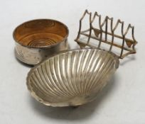 A George VI silver shell dish, Sheffield, 1946, 14.2cm, a modern silver mounted wine coaster and a