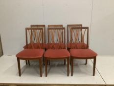 A mid century G Plan teak extending dining table, width 168cm extended, depth 122cm, height 73cm,