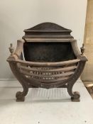 A George III style brass mounted cast iron serpentine fire grate, (lacking side bolts), width