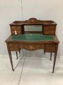 An Edwardian marquetry inlaid rosewood bow front kneehole desk, width 91cm, depth 47cm, height