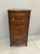 A reproduction Queen Anne style walnut six drawer narrow bow front chest, width 60cm, depth 47cm,