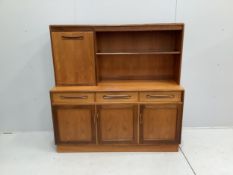 A mid century G Plan teak sideboard, width 142cm, depth 44cm, height 140cm. Condition - fair