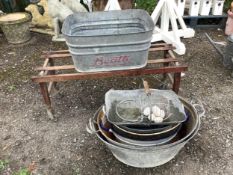 A vintage Beatty Bros. Ltd. folding wheeled stand and galvanised container, six other galvanised and