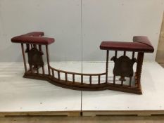 An early 20th century wrought and cast iron bow front club fender, width 160cm, depth 56cm, height