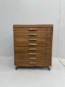A mid century oak eight drawer plan chest, width 74cm, depth 59cm, height 88cm. Condition - fair