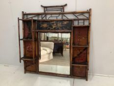 A late Victorian lacquered bamboo overmantel mirror, width 121cm, depth 16cm, height 129cm.