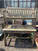 A set of four weathered teak folding garden armchairs, width 52cm, height 98cm, together with a