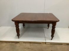 A late Victorian walnut extending dining table, width 232cm extended, two spare leaves, depth 118cm,