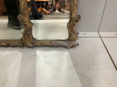A late 19th century gilt and composition triple plate overmantel mirror, width 113cm, height 60cm.