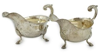 A late 18th/early 19th century Dutch? silver pear shaped teapot, with embossed trellis and thistle