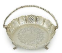A Victorian pierced silver shallow circular cake basket, by Henry Wilkinson & Co, with engraved
