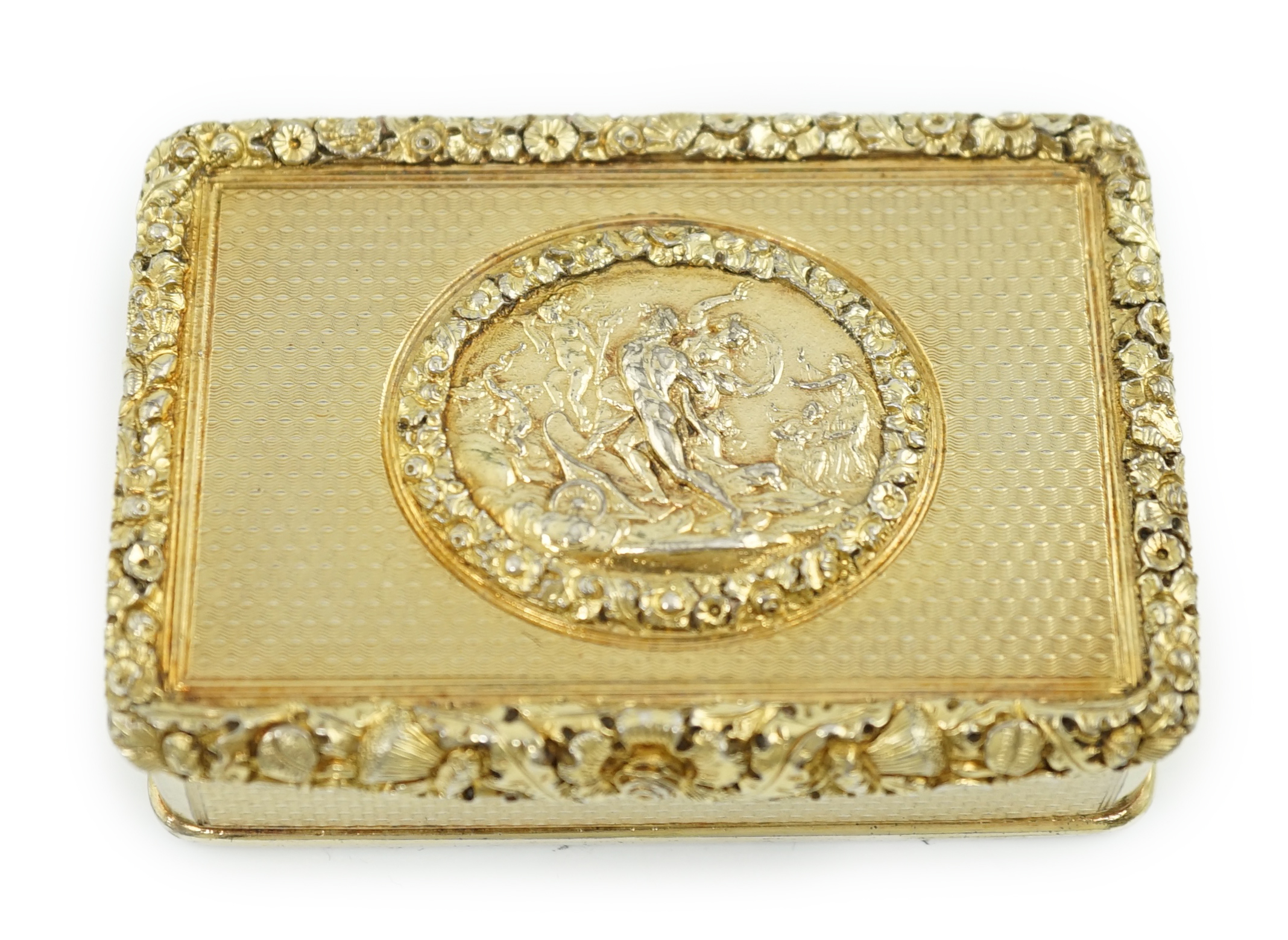 A late George III engine turned silver gilt rectangular snuff box, by William Snooke Hall, the cover